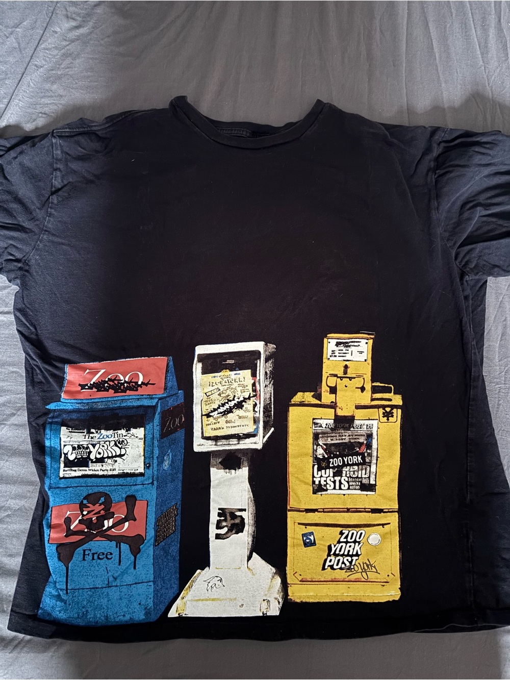 Zoo York Black Tee with Blue, White, Yellow Newspaper Box Graphic